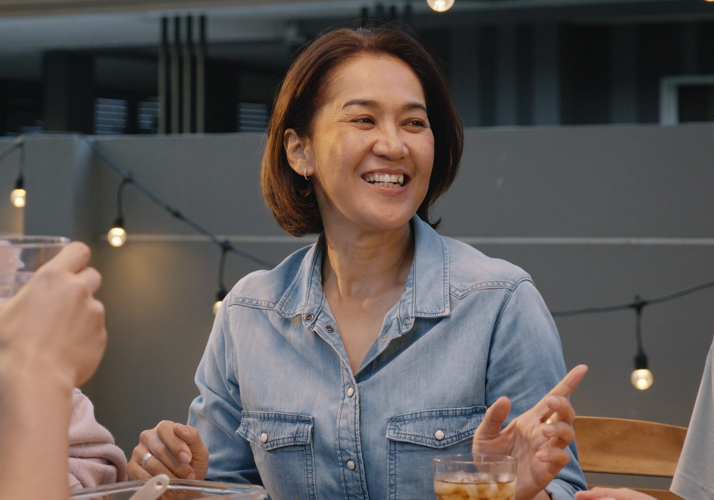 Illustrative patient image discussing treatment with care team